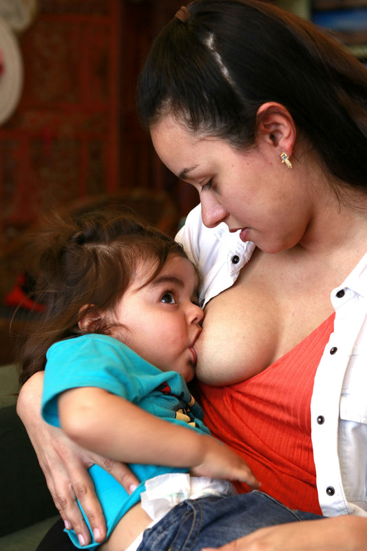 A mother breastfeeding her baby
